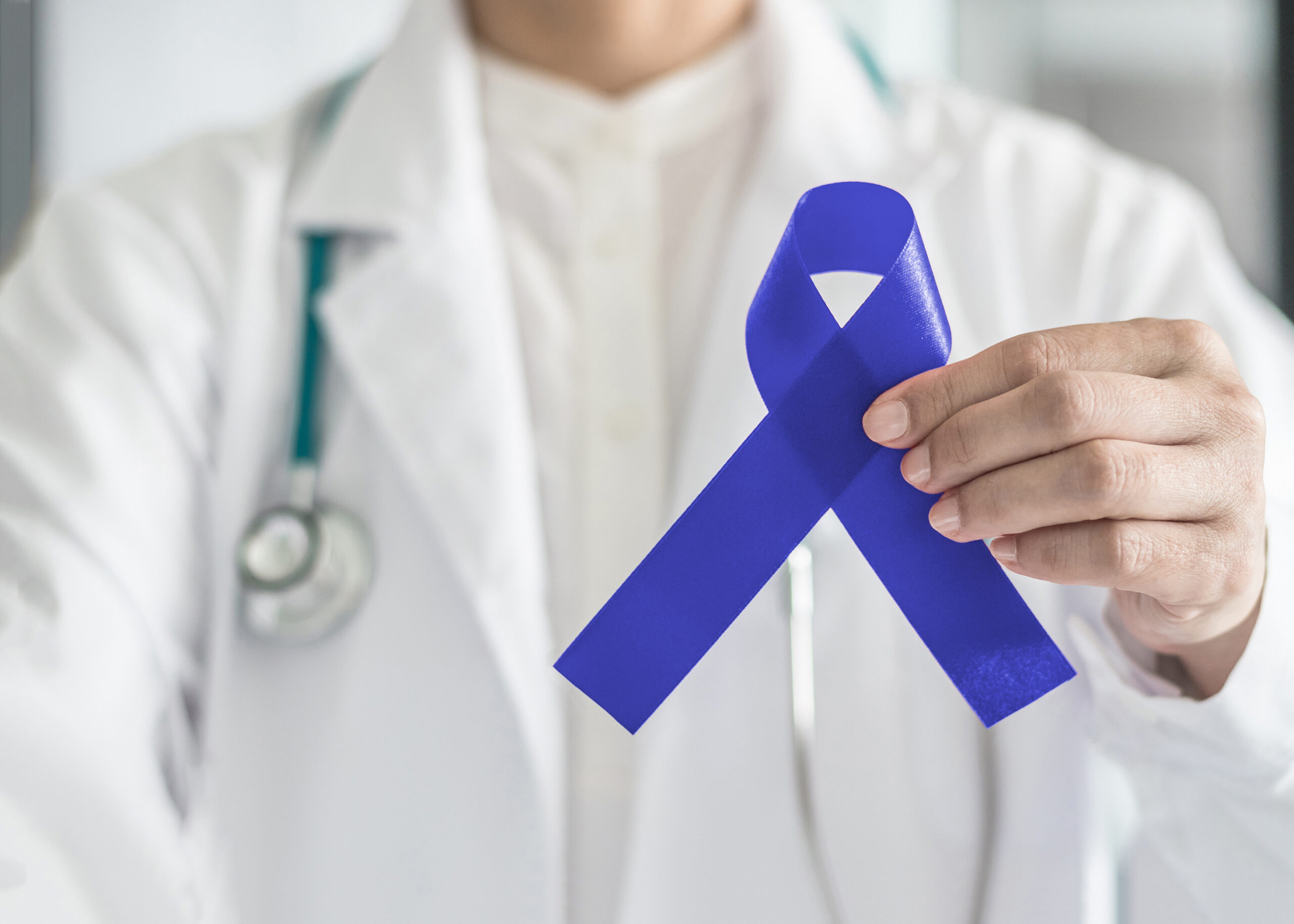 Dark blue ribbon for colon - colorectal cancer awareness on medi